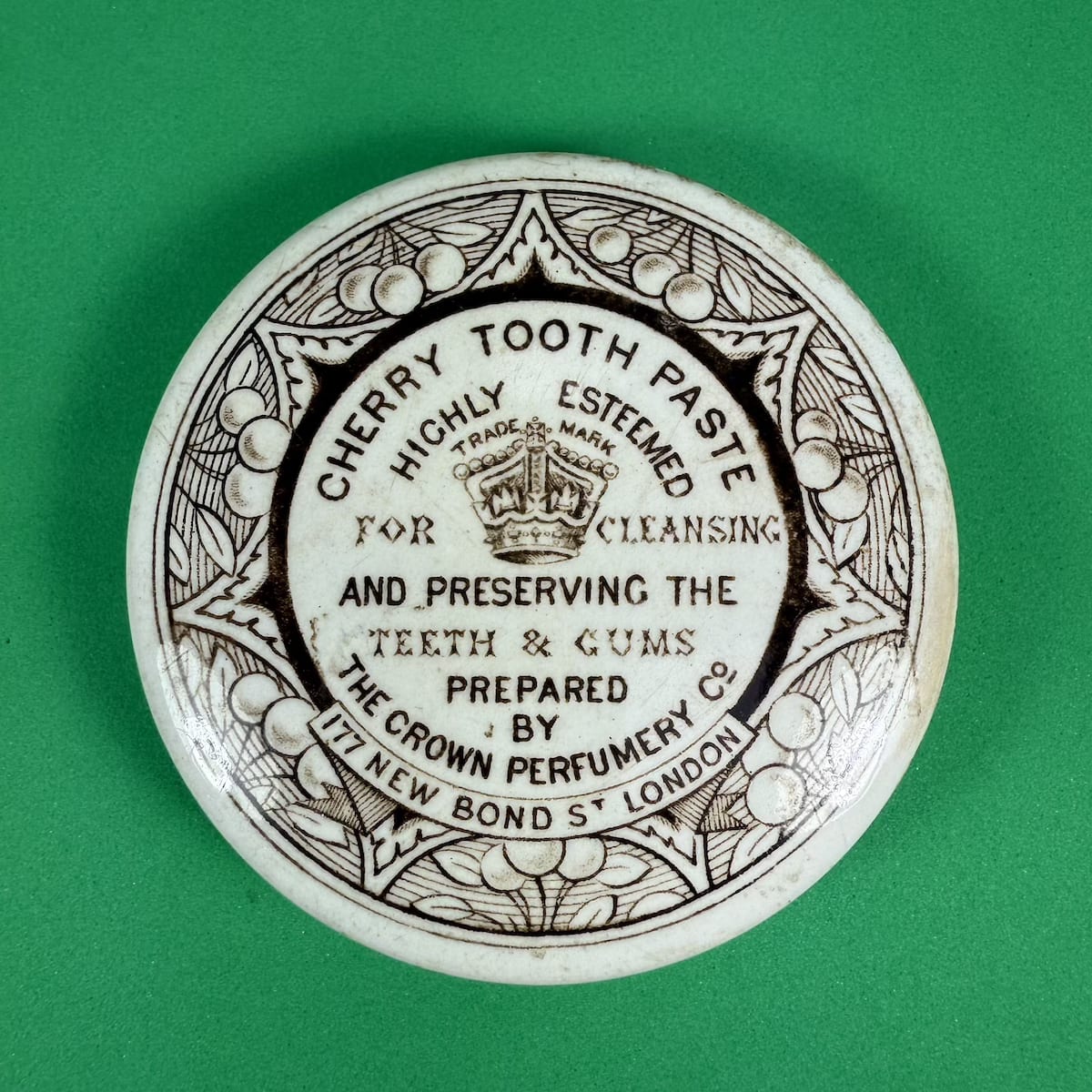 Pot Lid. The Crown Perfumery Co. 177 New Bond St London. Cherry Tooth Paste. Brown Print. 81 mm diameter.