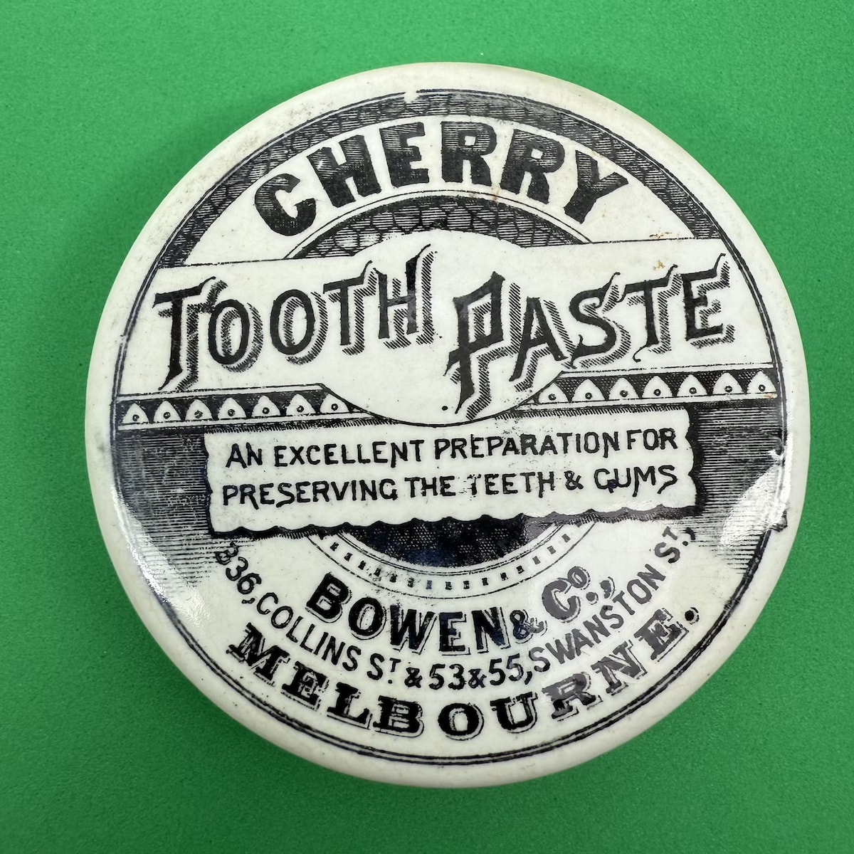 Pot Lid. Bowen & Co, Collins St & Swanston St., Melbourne. Cherry Tooth Paste. Round. Black & White. (Victoria)