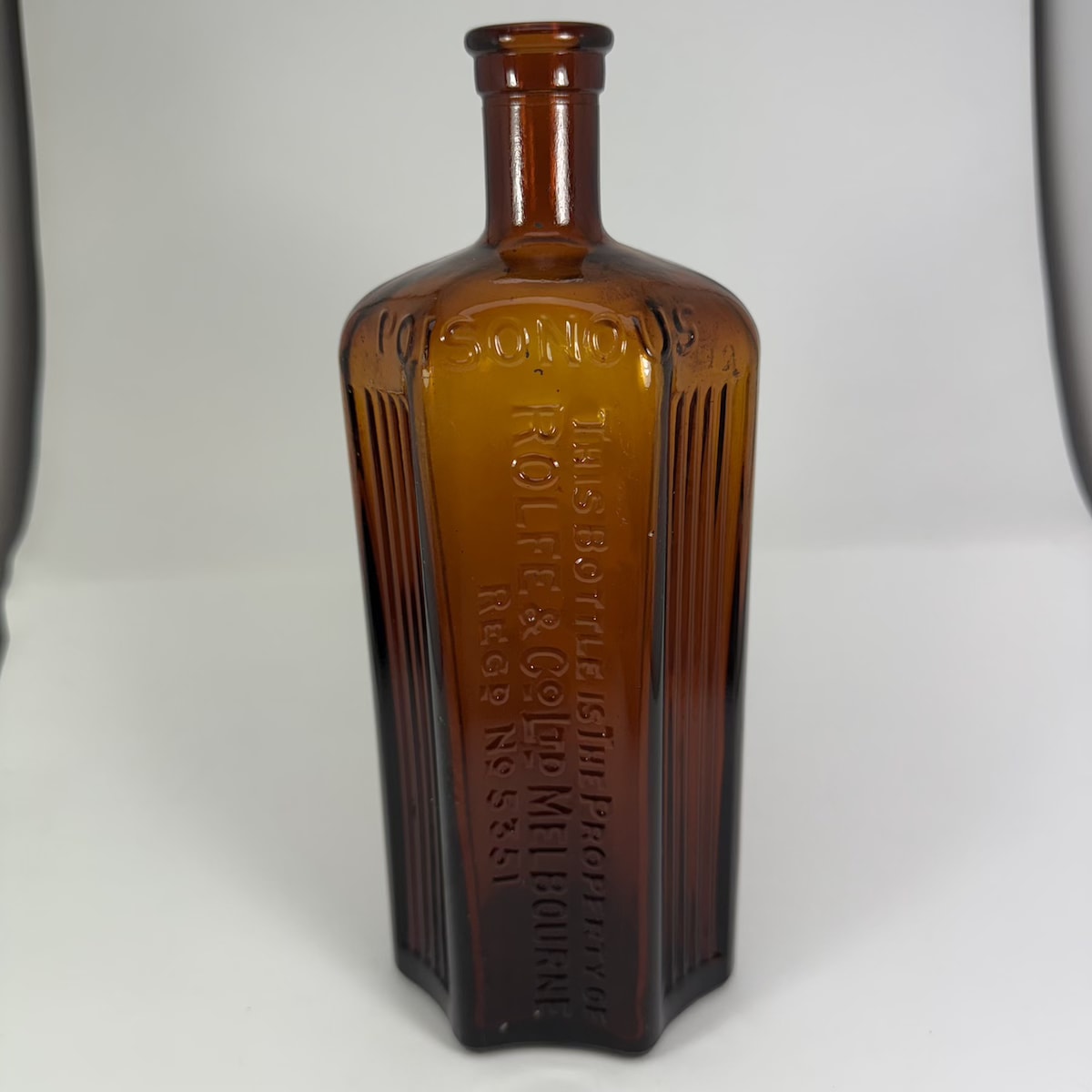 Phenyle. Rolfe & Co Ltd Melbourne. Amber. Registered Design. 26 oz. (Victoria)