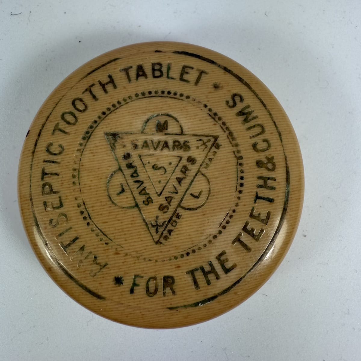 Pot Lid & Base. Well a Celluloid one. Savars Antiseptic Tooth Tablet for the Teeth & Gums.