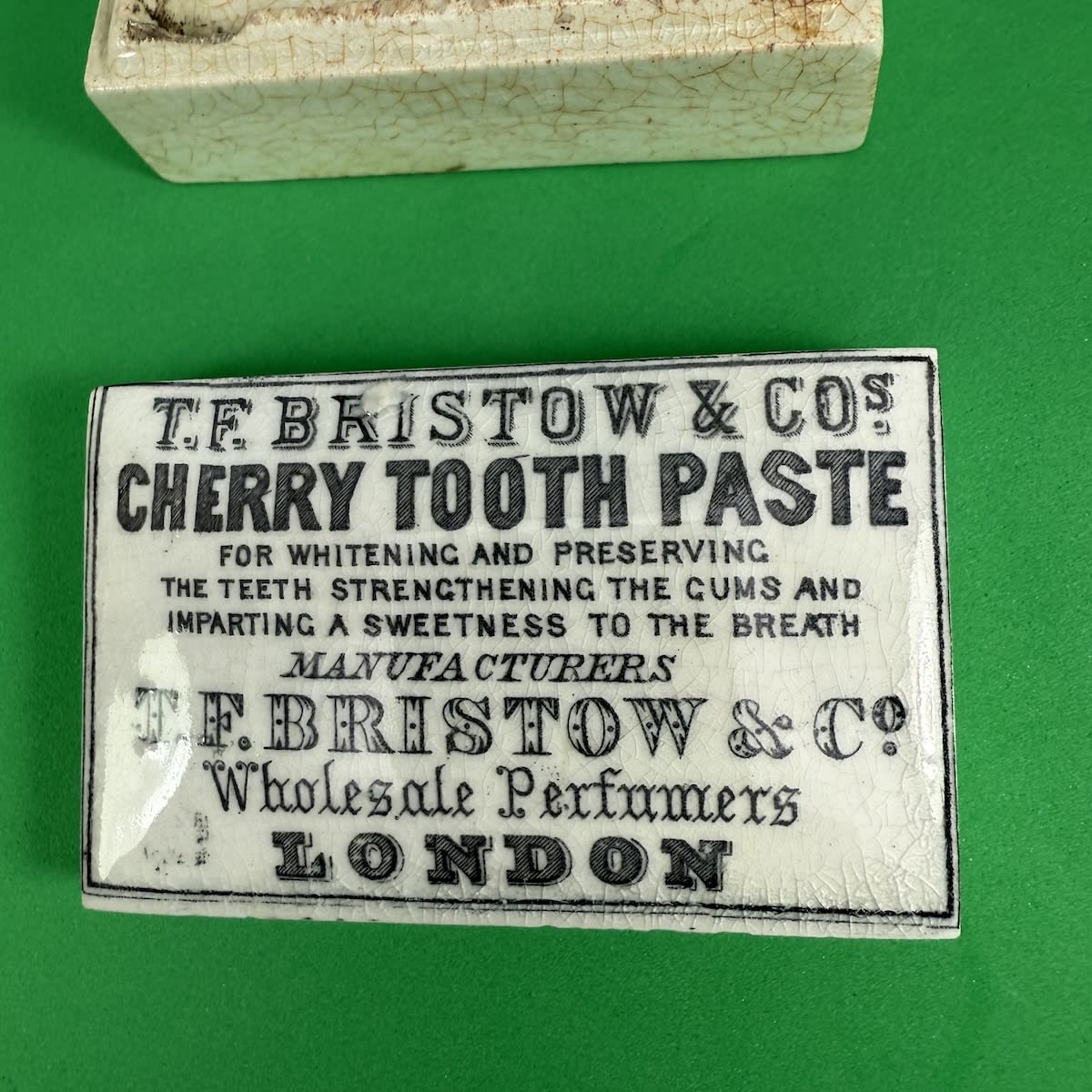 Pot Lid. T. F. Bristow & Cos, Cherry Tooth Paste. London. Rectangular lid.