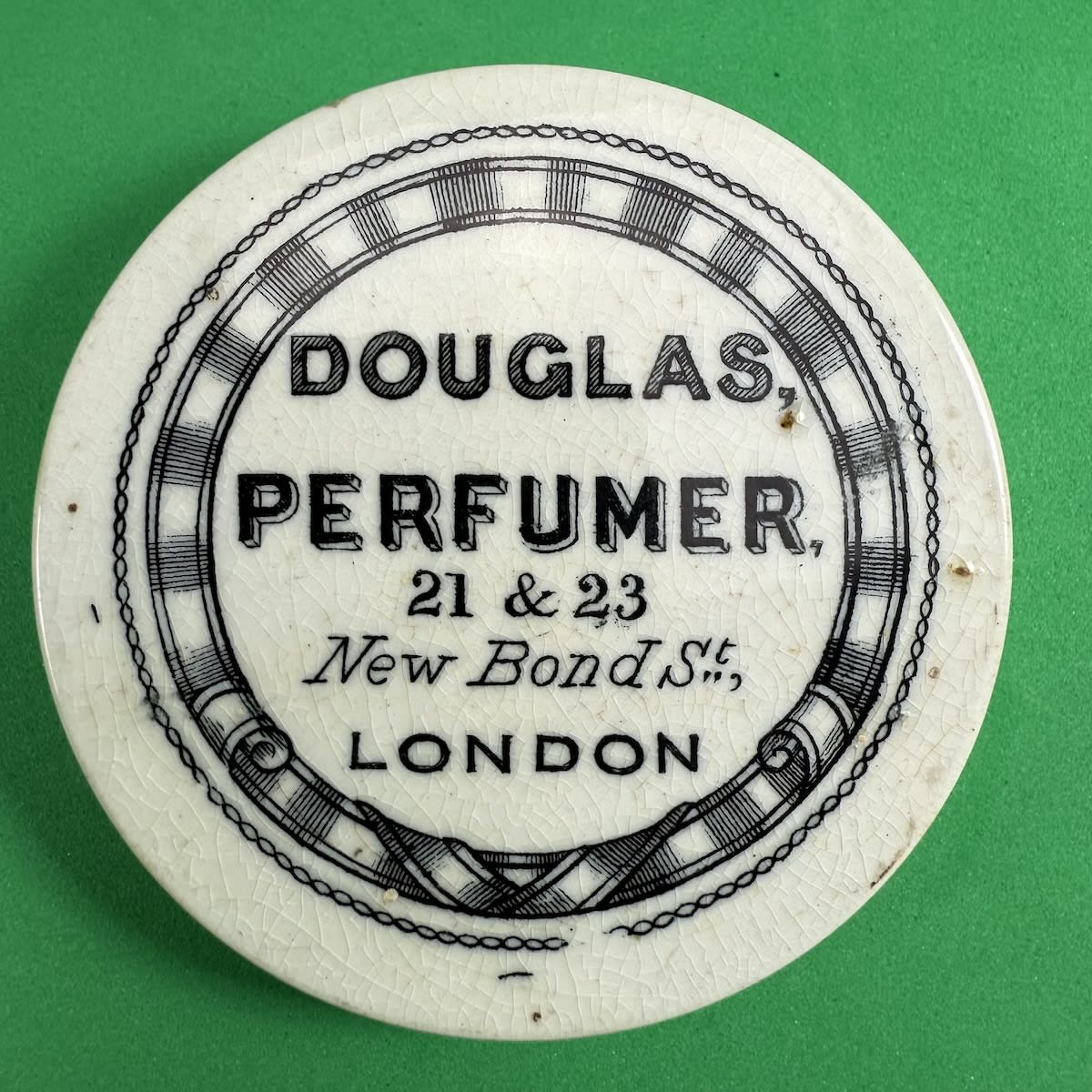 Pot Lid. Douglas, Perfumer, 21 & 23 Bond St., London.