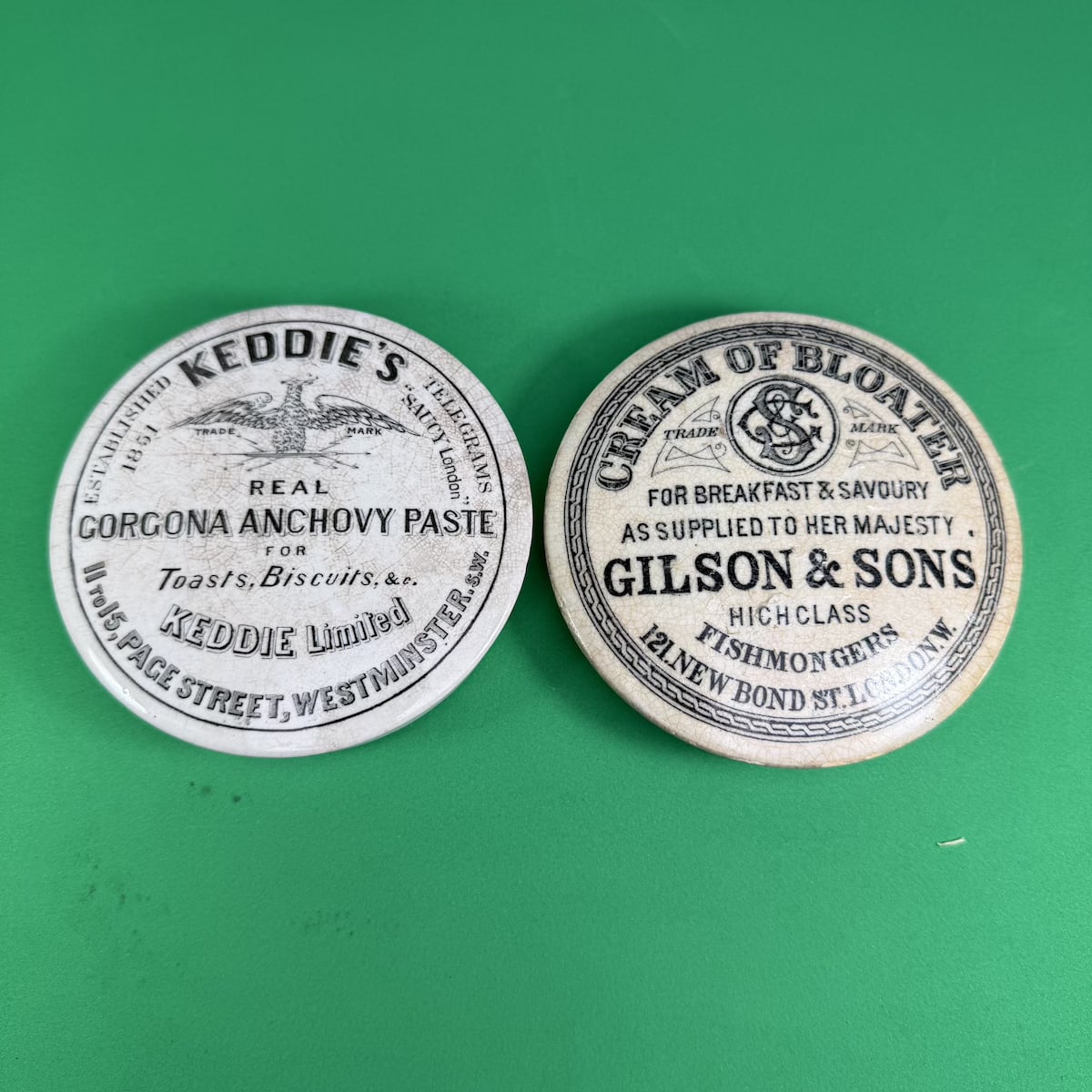 2 Pot Lids: Keddie's Real Gorgona Anchovy Paste, Westminster. Phoenix; Gilson & Sons, London, Cream of Bloater.