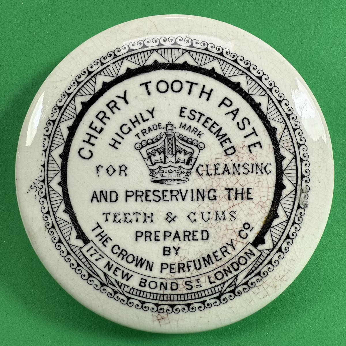 Pot Lid. Crown Perfumery Co., Highly Esteemed Cherry Tooth Paste, 177 New Bond St., London.