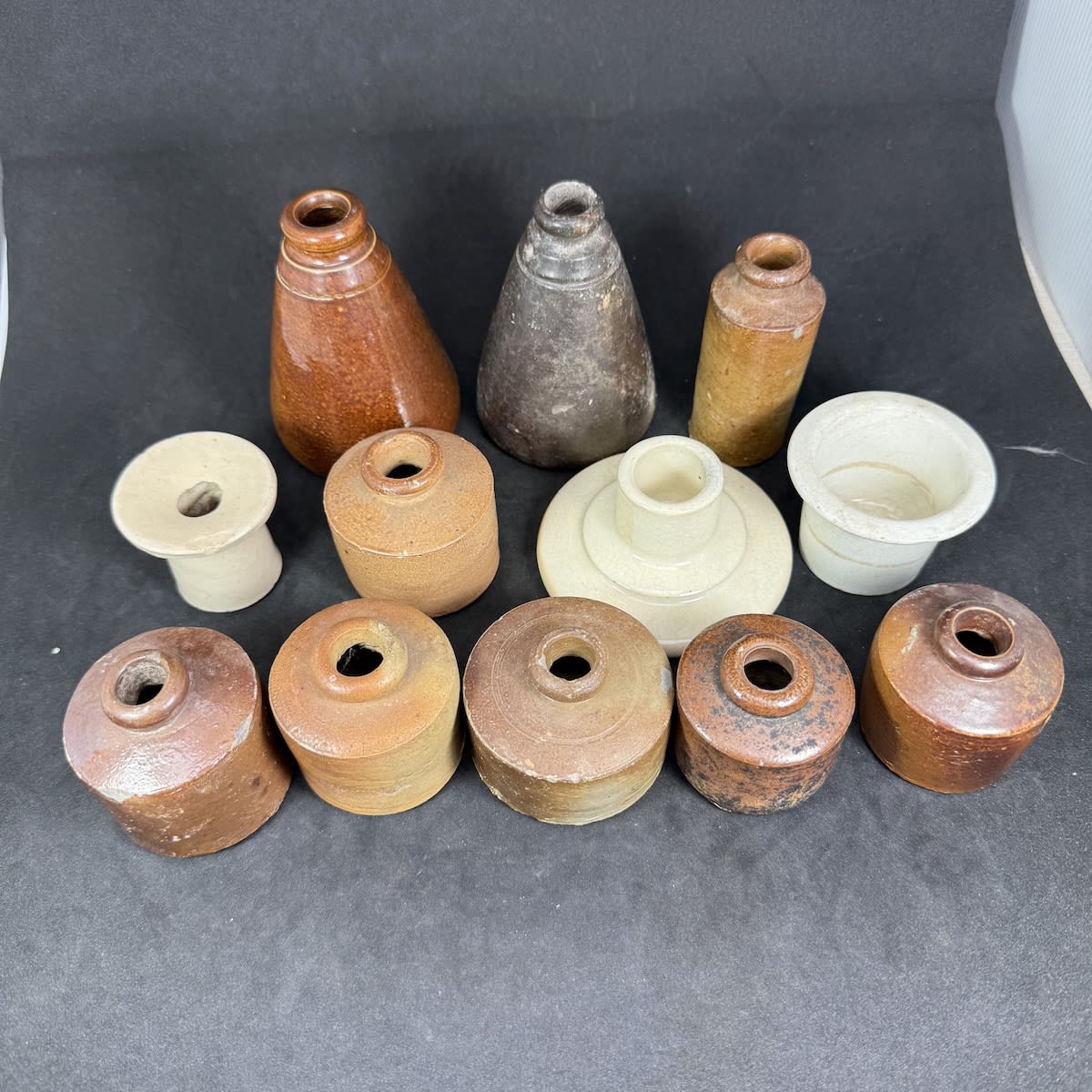 12 Stoneware & pottery inks and inkwells.