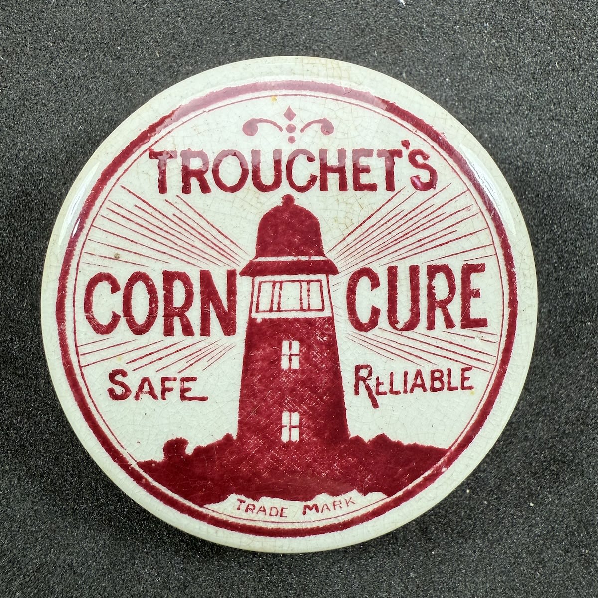 Pot Lid. Trouchet's Corn Cure. Lighthouse. Red Print. (Western Australia)