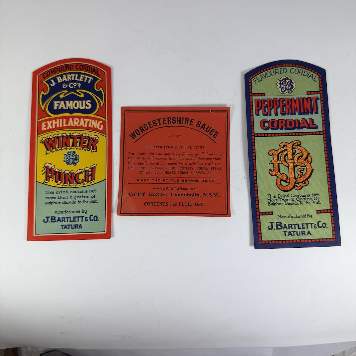 3 Labels: 2 x J. Bartlett & Co Tatura, Peppermint Cordial and Winter Punch; 1 x Oppy Bros Condobolin, Worcestershire Sauce.