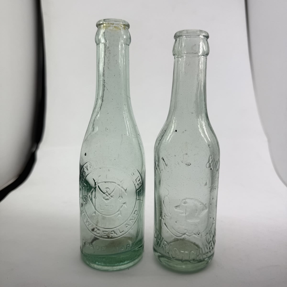 2 NZ Crown Seals: Grey & Menzies Ltd, Monogram; H. Mace & Co., Christchurch. Dogs Head in a Shield. 5-6 oz. (New Zealand)