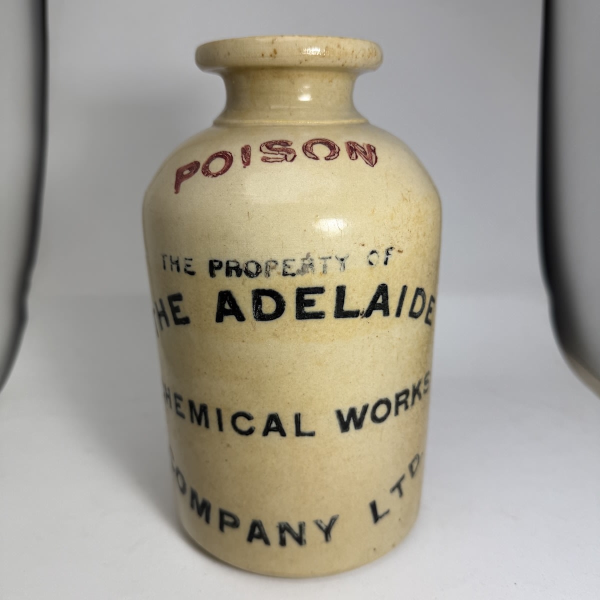 Quart Demijohn. The Adelaide Chemical Works Company Ltd. Poison. Internal Thread. All White with red & black print. (South Australia)