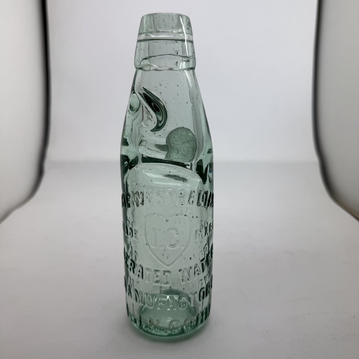 Codd. The Westralian. I. J. K. Cohn. Love Heart. Angled Cross Pinch - Empress Patent type. 6 oz. (Western Australia)