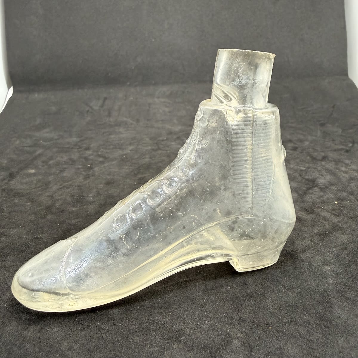 Ink. Large Shoe Ink. Figural. Elastic sided boot ink. Bows to front and back. Ground lip.