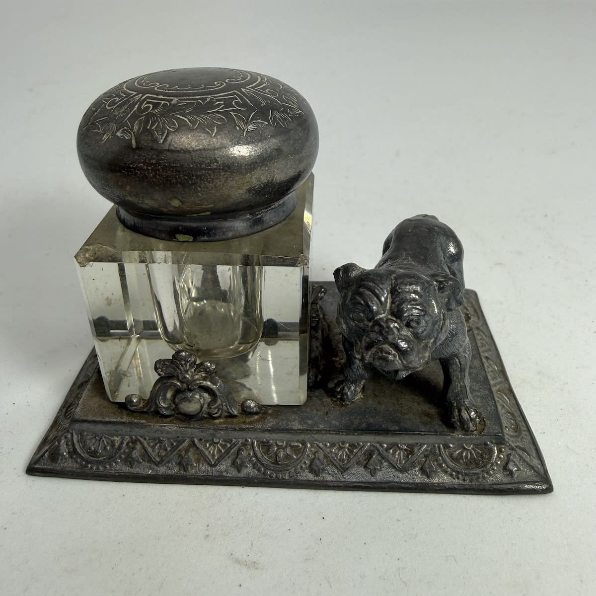 Small inkwell desk decoration. Silver plated stand. Figure of a bulldog. Glass inkwell with pewter cap. Knickerbocker Silver Co. 1667.