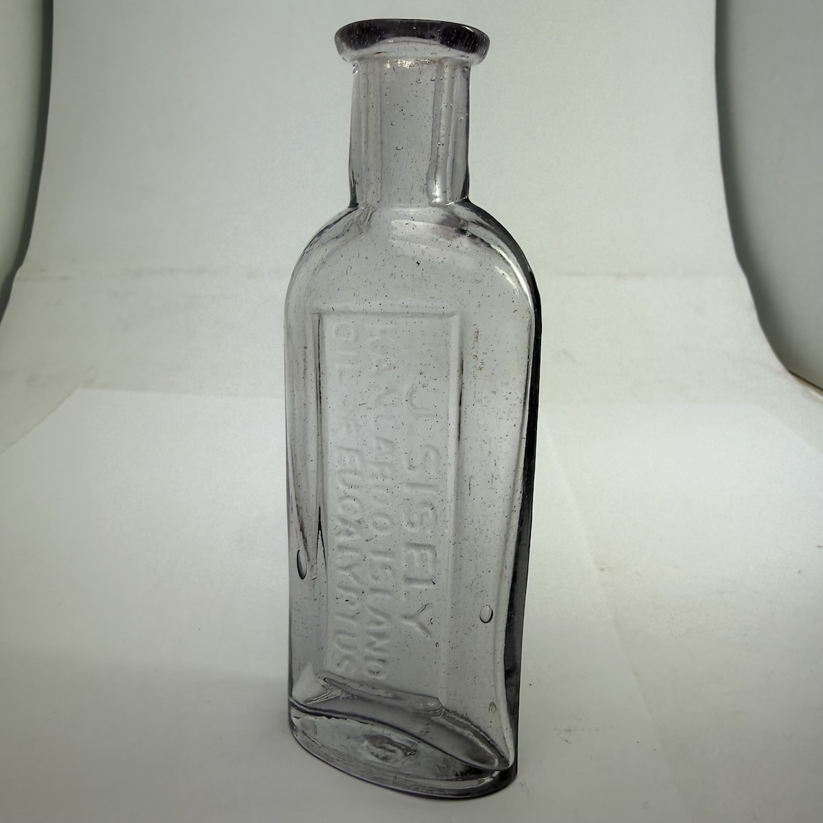 Eucalyptus Oil. J. Sisely, Kangaroo Island. Heavy clear Flint glass like bottle. 2 oz. (South Australia)