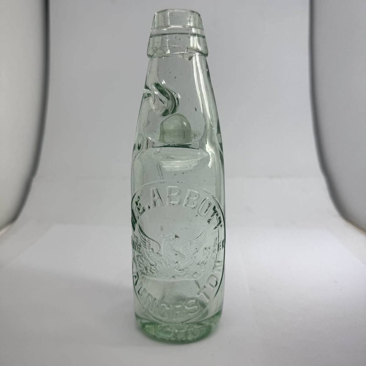 Codd. M. E. Abbott, Launceston. Phoenix. One Way Pour. Kilner Bros made. 6 oz. (Tasmania)