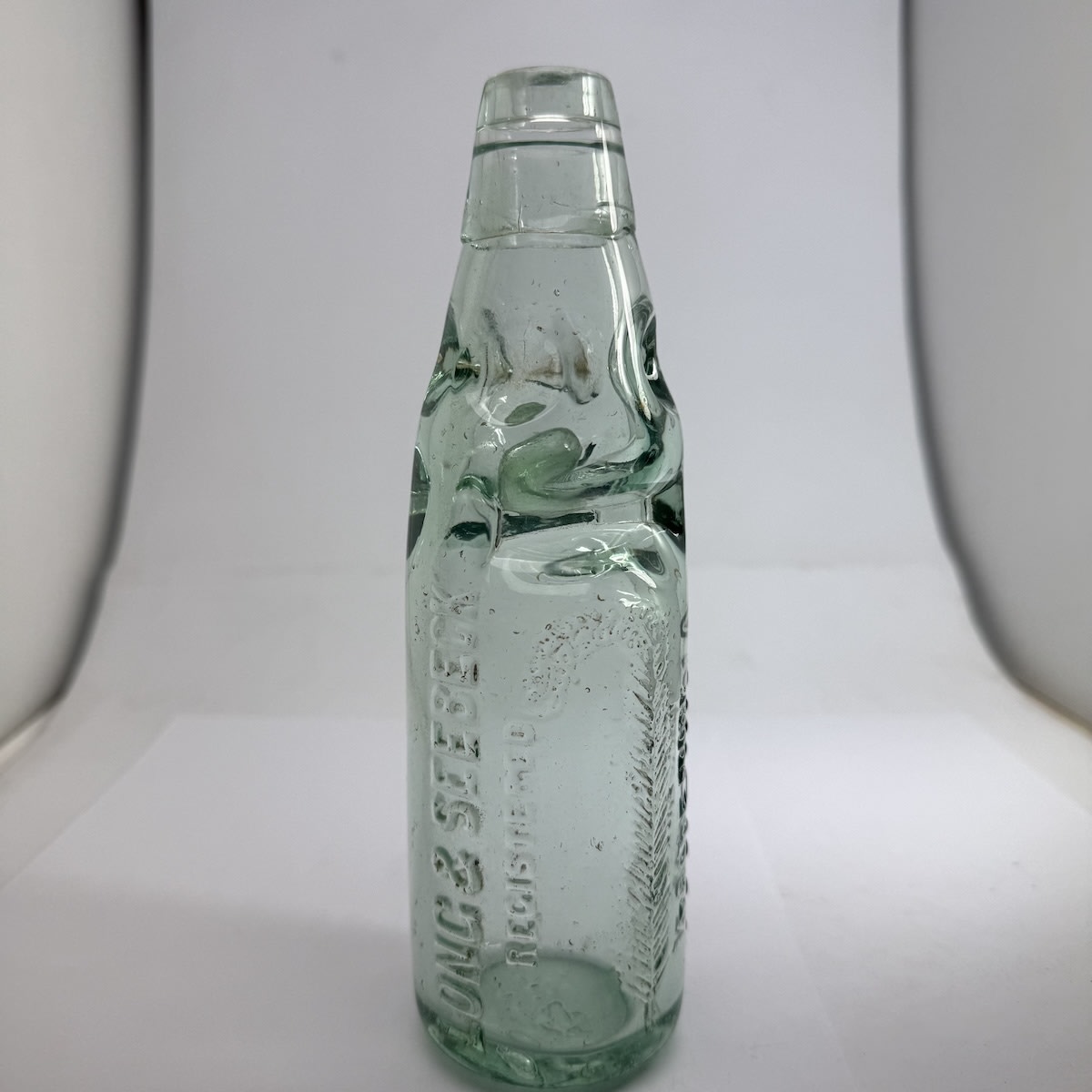 Codd. Long & Seebeck, Kanowna. White Feather. Kilner Bros made. Dobson. 6 oz. (Western Australia)