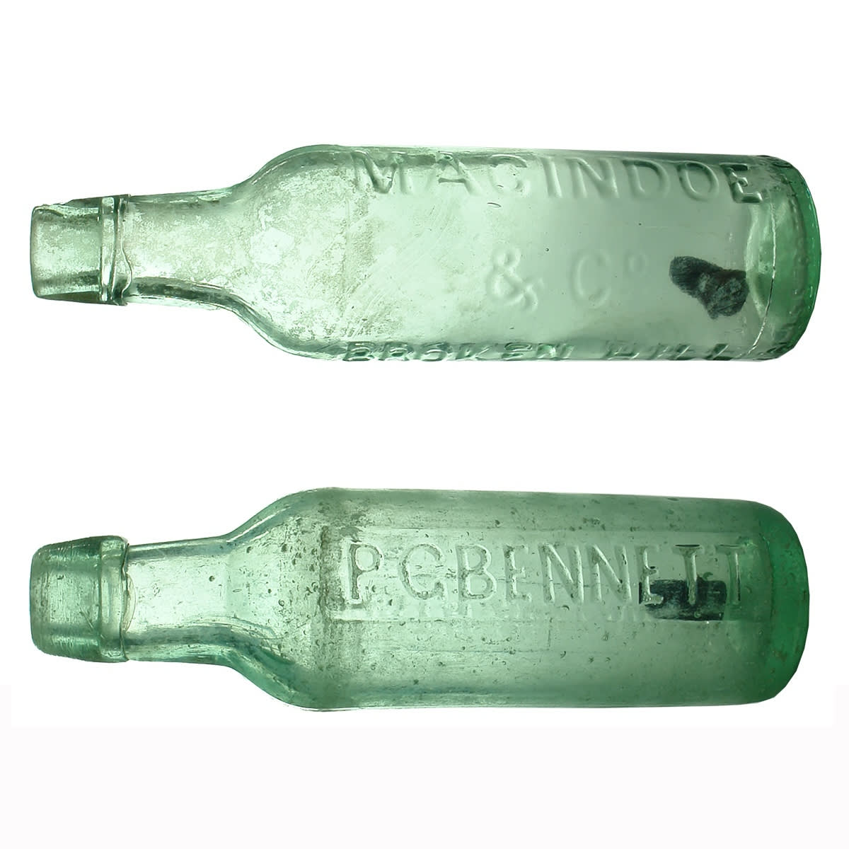 2 Lamonts. Macindoe & Co, Broken Hill. Melbourne Glass Bottle Works; P. G. Bennett, North Adelaide in rectangular panels down each side. (New South Wales & South Australia)