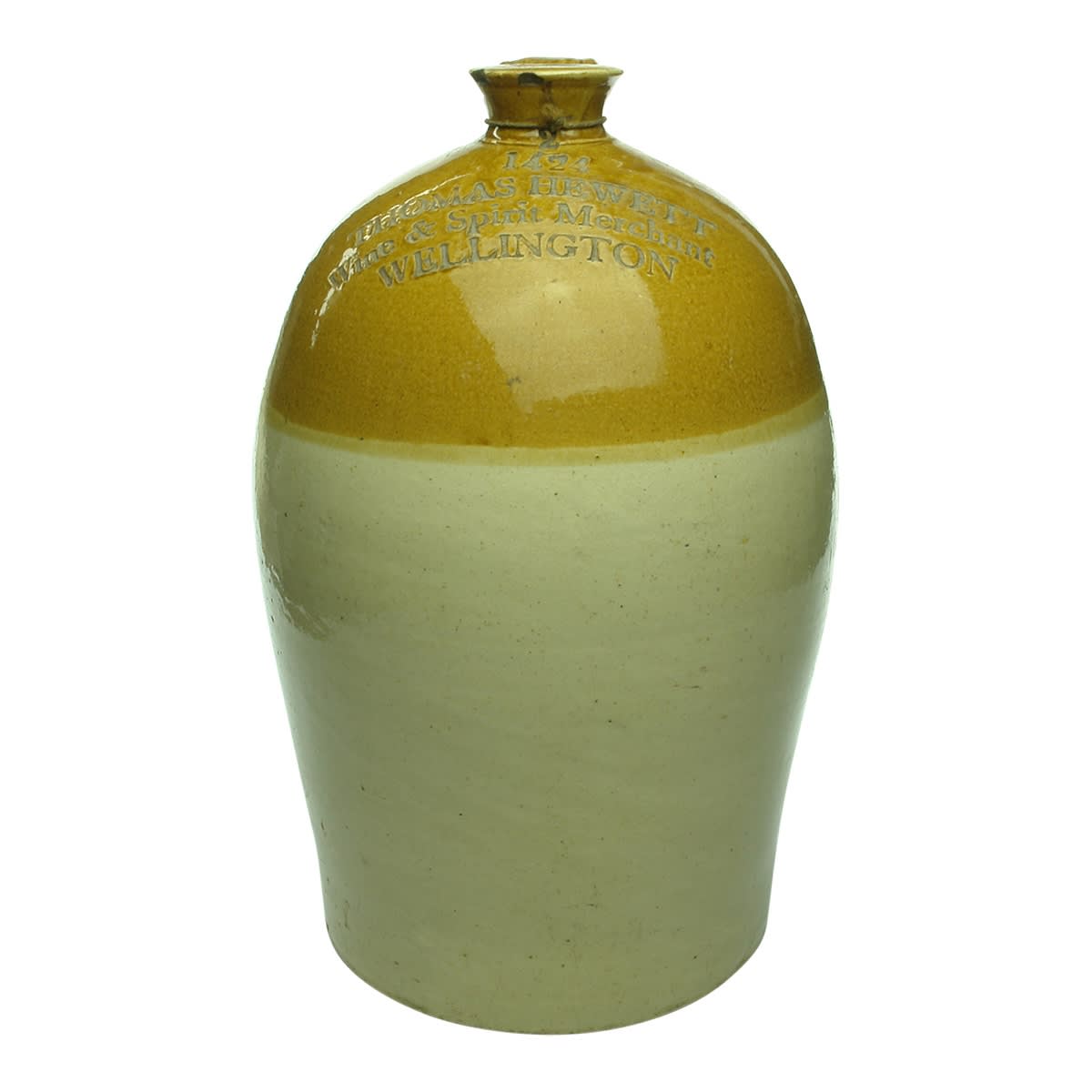 Demijohn. Thomas Hewett, Wine & Spirit Merchant, Wellington. Beehive Shape. Impressed. 2 Gallon. (New Zealand?)