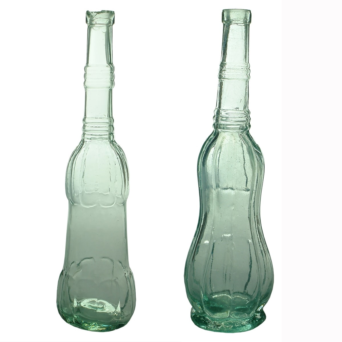2 Goldfields Salad Oils: Club oil, bulbous pattern around base and shoulder, flat middle section; Pear or Peanut Oil, similar shape but with half the pattern continuing in the middle.
