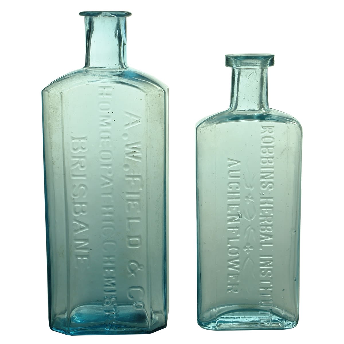 2 Chemists: A. W. Field & Co, Homeopathic Chemists, Brisbane (161 mm); Robbins Herbal Institute, Auchenflower (140 mm). (Queensland)