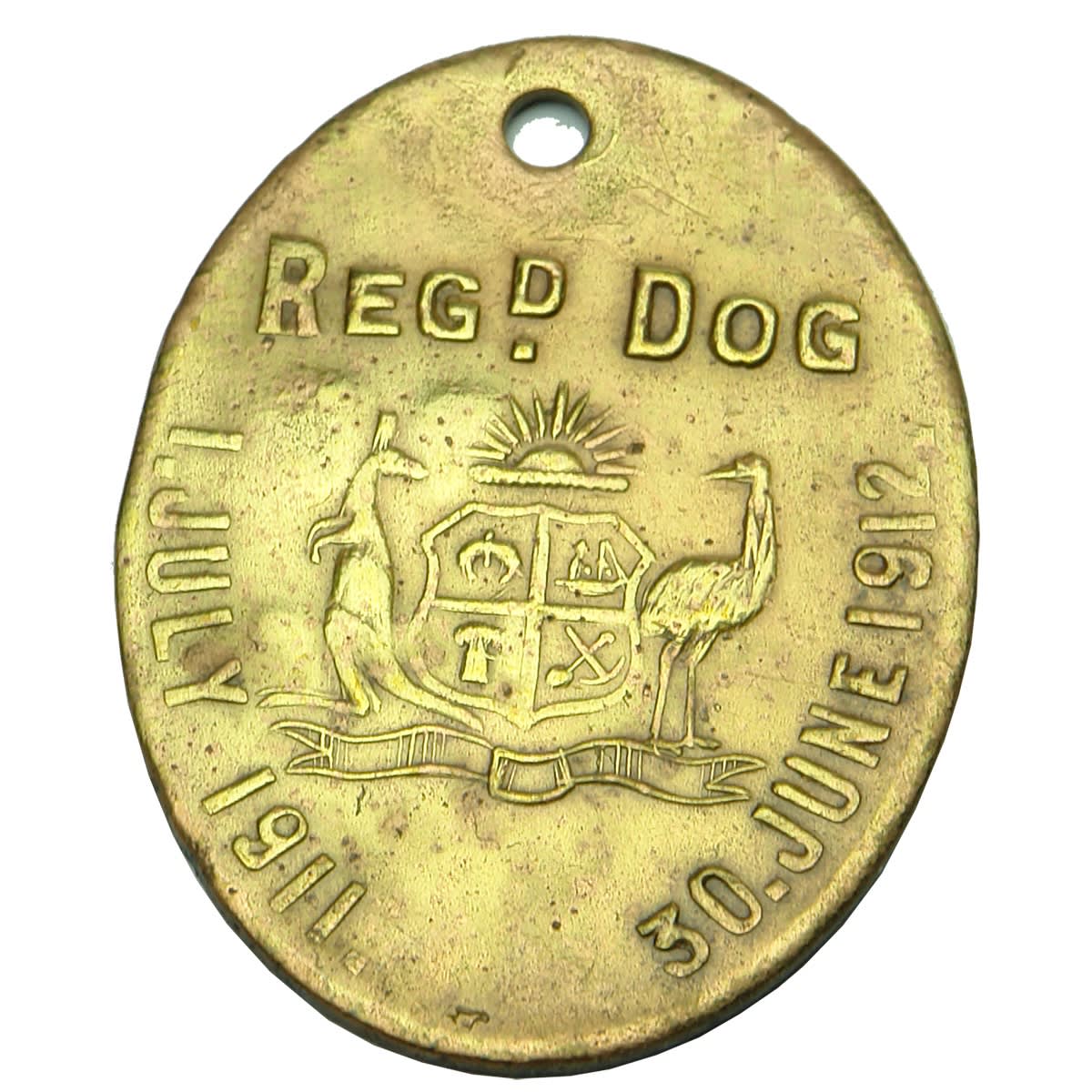 Metalware. South Australian Registered Dog Tag with Australian Coat of Arms, 1 July 1911 - 30 June 1912, Reg No 83, Dist. 193. Upright Embossing on Oval Shape. (South Australia)