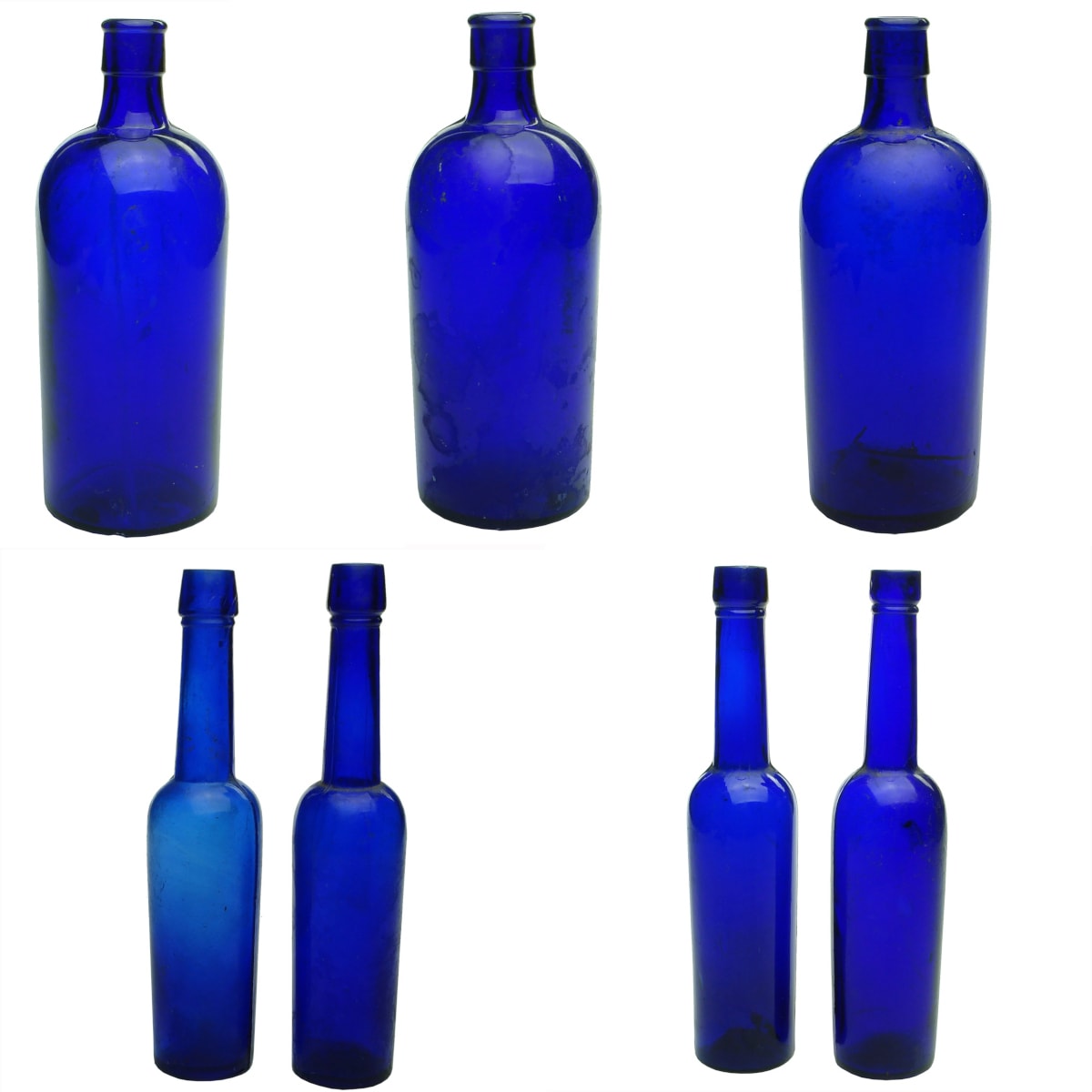 7 Blue Glass Bottles: 3 x 18-20 oz Essences; 4 x 5 oz Castor Oils.
