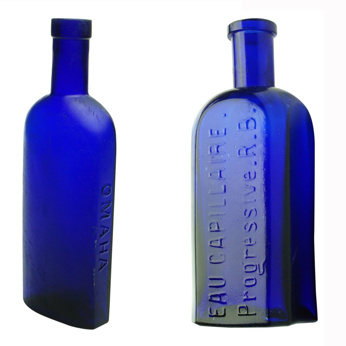 Pair of blue bottles: 1. Omaha Disinfectant. Cobalt. 8 oz. 2. Eau Capillaire, Progressive R. B. Cobalt. 4 oz,