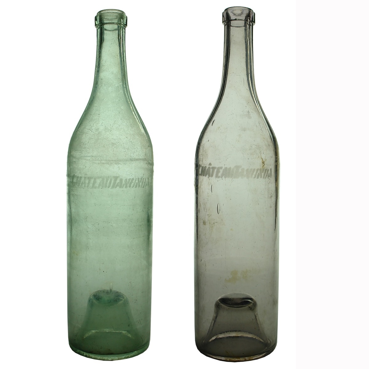 2 Brandies: Chateau Tanunda sandblasted on upper body. Aqua & Sun Coloured Amethyst. 26 oz. (South Australia)