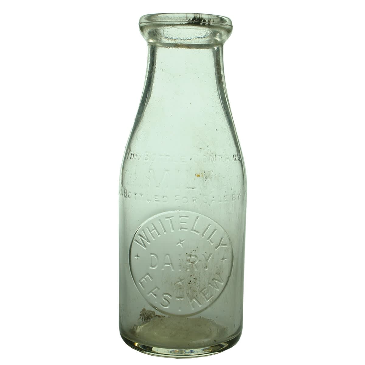 Milk. White Lily Dairy, East Kew. Base Number: 189. Wad Lip. Clear. 1 Pint. (Victoria)