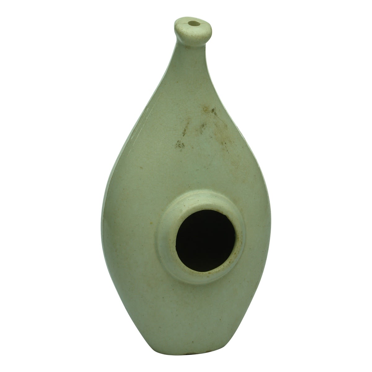 Feeder. Plain white ceramic baby feeder.