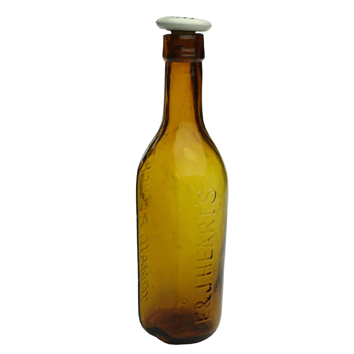 Sauce. E & J. Heart's Tomato Relish. Original Ceramic Stopper. Flat back. Amber. 13 oz. (Wagga, New South Wales) (Late Kingsley Durdin Collection)