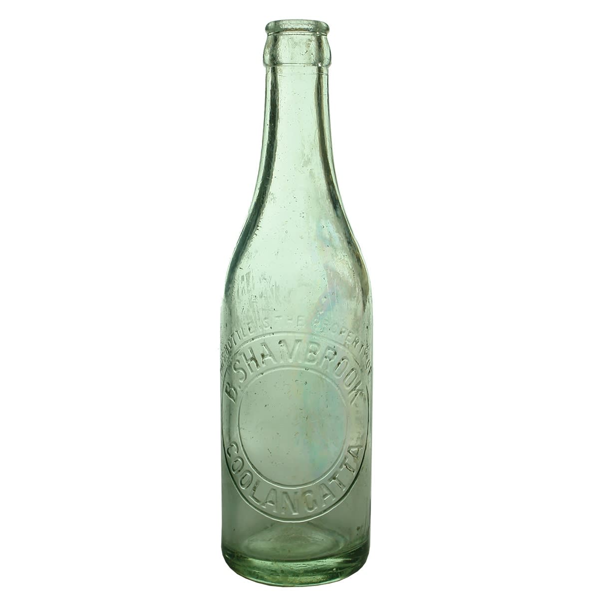 Crown Seal. B. Shambrook, Coolangatta. Straight AGM base mark. "This bottle..." embossing and smaller embossing in circles. Aqua. 10 oz. (Queensland)