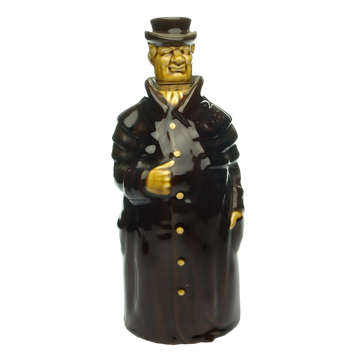 Whisky. Kingsware like Decanter. Man in heavy overcoat, Head and hat form the stopper. Foreign printed on base.