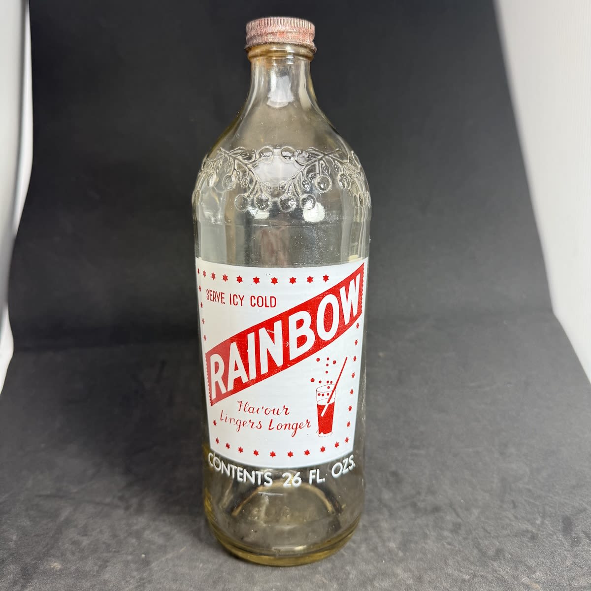 Ceramic Label Cordial. Rainbow Drinks Pty Ltd, Maitland S. A. Screw top. Fruit pattern around shoulder. (South Australia)