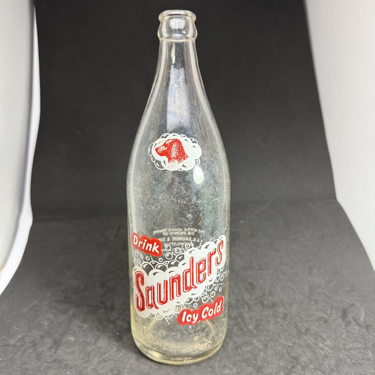 Ceramic Label Crown Seal. A. G. Saunders & Son, Muswellbrook. Dogs Head. Red & White. 24 oz. (New South Wales)
