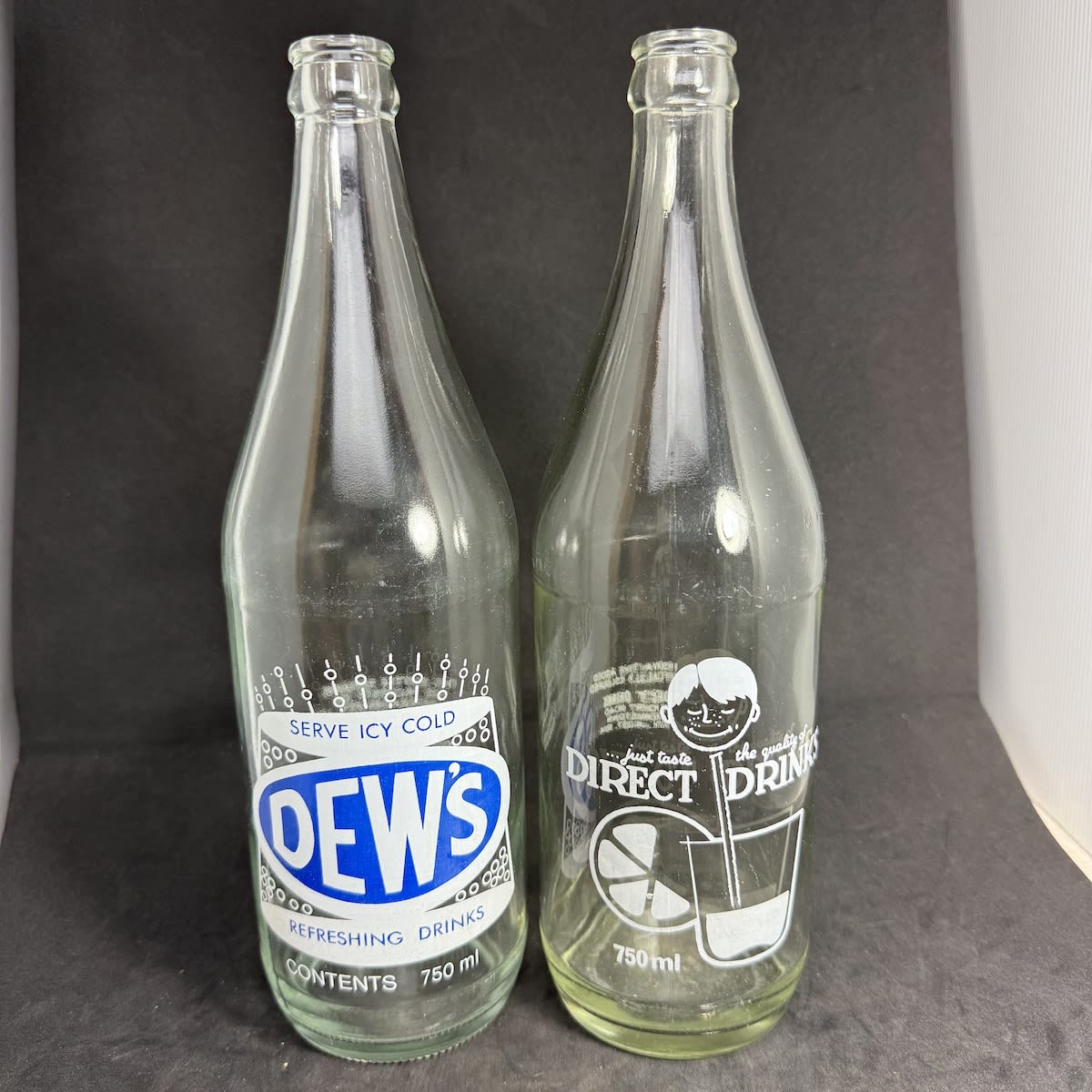 2 Ceramic Label Crown Seals. Dew's Beverages Pty Ltd, Thebarton Direct Drinks, 185 Port Road, Queenstown. (South Australia)