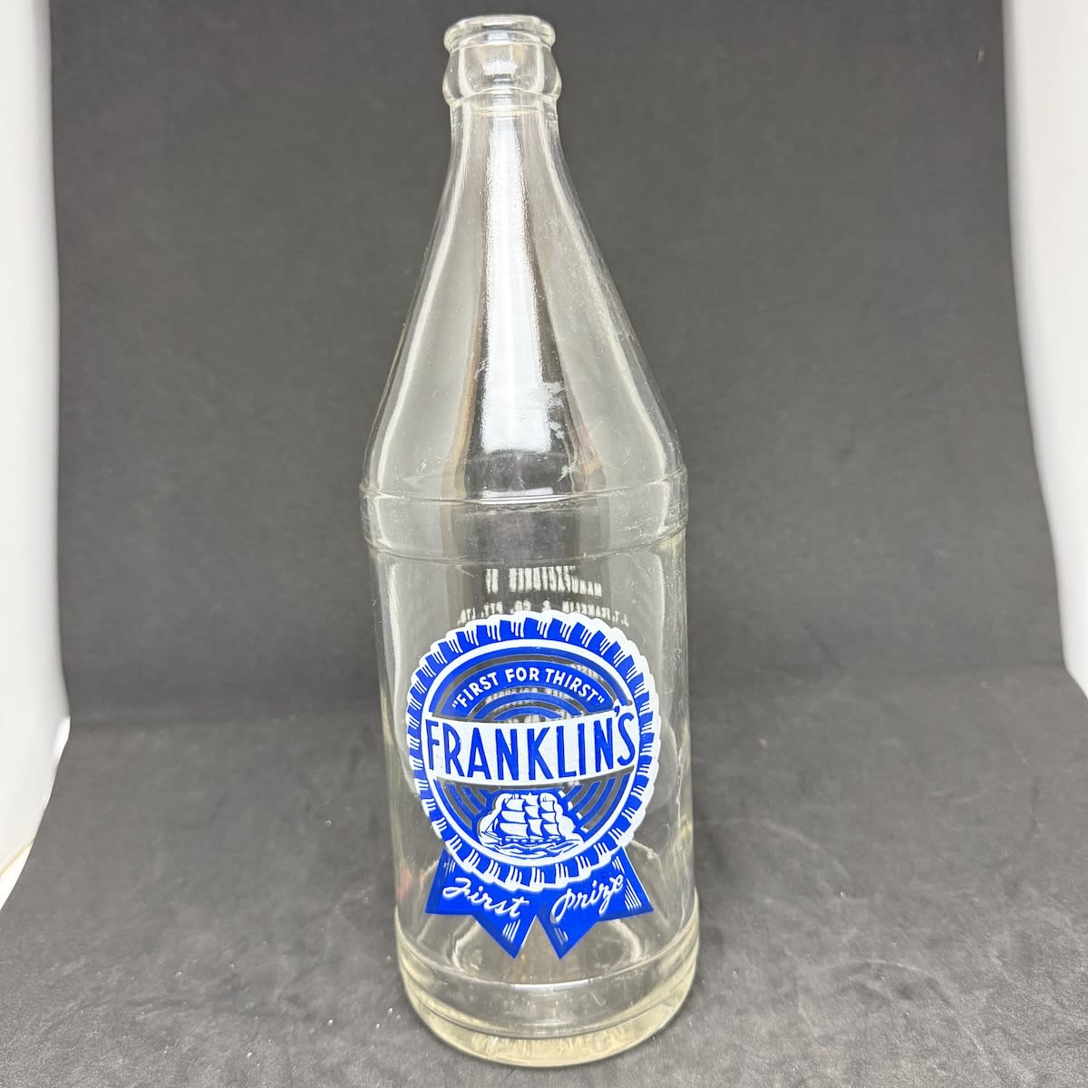 Ceramic Label Crown Seal. J. T. Franklin & Co Pty Ltd, Fenwick St., Geelong. Franklins. Sailing Ship. 26 oz. Squat with thick bands around shoulder and base. (Victoria)