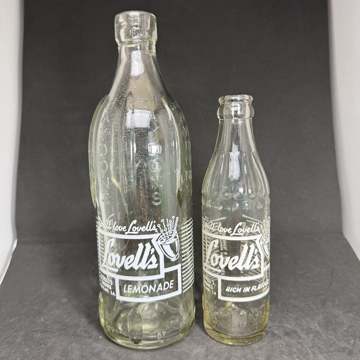 2 Lovell's Ceramic Label Bottles: Lovell's Drinks Maitland SA. One on a Haydons Queenstown Internal Thread and small Crown Seal. (South Australia)