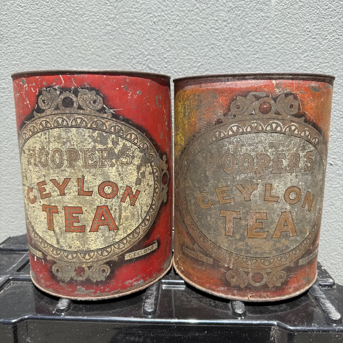 2 Large Tea Tins: Both Hoopers Ceylon Tea, Moorabool St., Geelong. Scenes of Shippping at Corio Bay on one and Geelong from the Eastern Beach on the other. (Victoria)