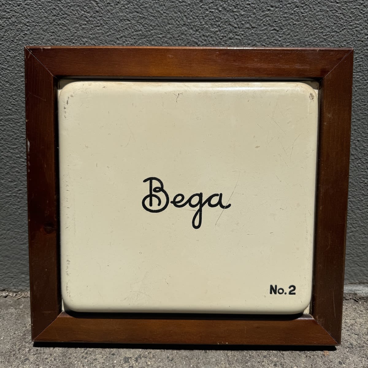 Enamel Stove Door. Bega. No. 2. Framed.