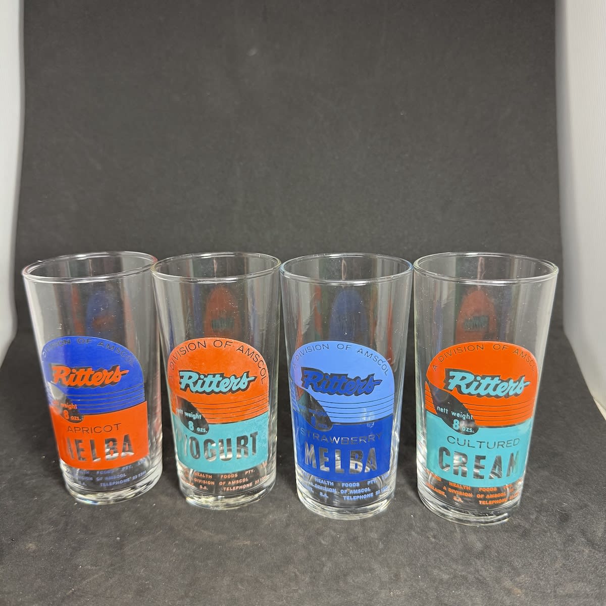 4 Yoghurt/Cream Glasses: Ritters, Apricot Melba, Yogurt, Strawberry Melba, Cultured Cream. A division of AMSCOL Adelaide. (South Australia)