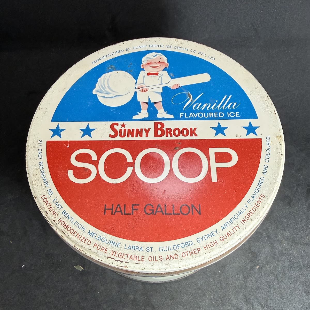 Ice Cream Tin. Sunny Brook Ice Cream Co Pty Ltd. East Bentleigh Melbourne Guildford, Sydney. Half Gallon. Boy with Giant Ice Cream scoop. It's Massive! (Victoria & New South Wales)
