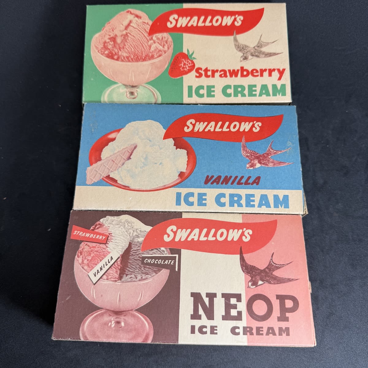 3 Light cardboard Ice Cream packets. Swallows Vanilla, Strawberry & Neop Ice Cream. Swall & Ariell (Ice Cream) Pty. Ltd. Rouse Street, Port Melbourne. (Victoria)