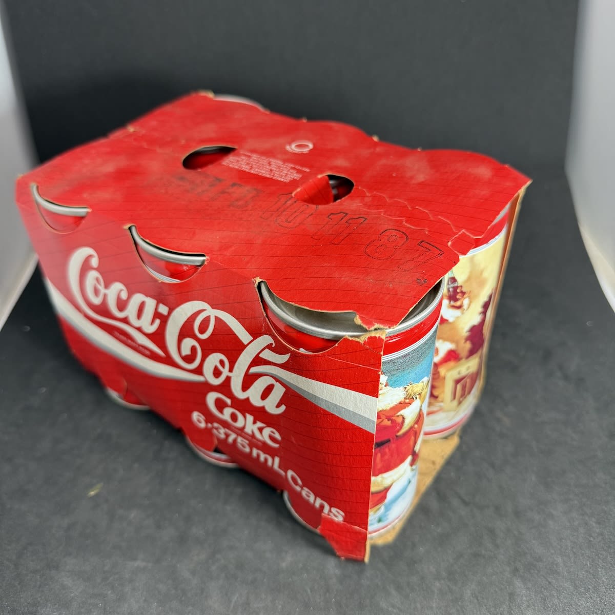 Pack of 6 Coca-Cola Coke 375 ml Cans. Christmas Theme. Coca-Cola Bottlers Canberra, 90 Yass Road Queanbeyan.