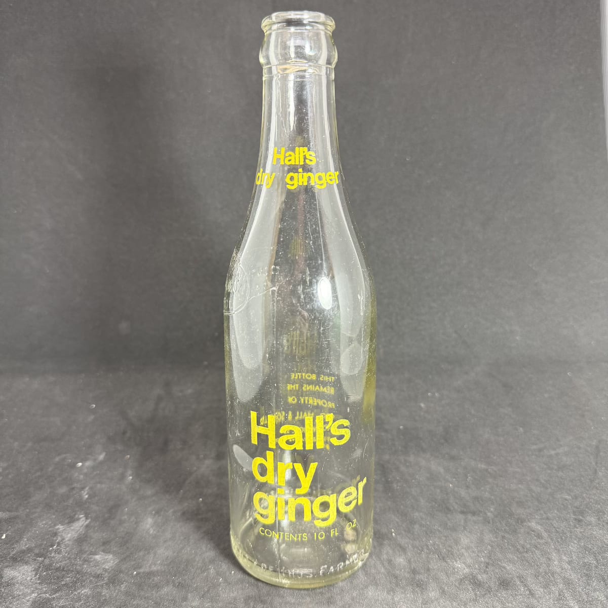 Ceramic Label Crown Seal. Hall's Dry Ginger 10 oz. Geo. Hall & Sons Ltd Norwood. On an embossed Thos. Farmer & Son, Naracoorte bottle. (South Australia)