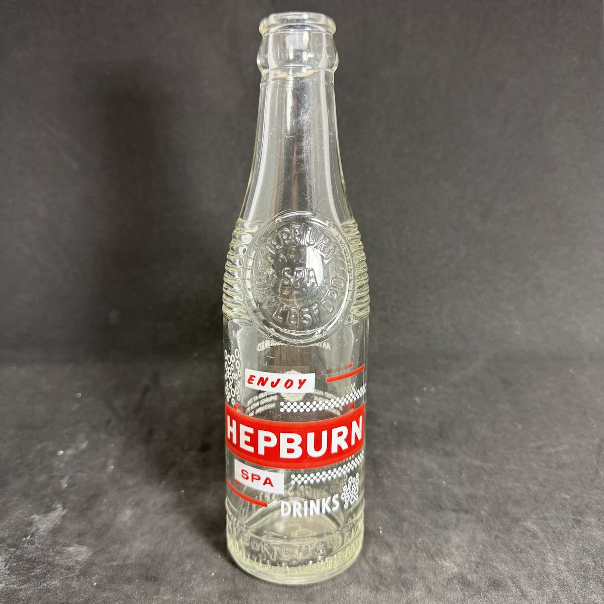 Ceramic Label Crown Seal. Hepburn Spa Company, Hepburn Springs. Daylesford. Red & White. "Bullet" shape bottle. (Victoria)