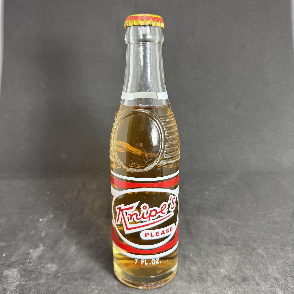 Ceramic Label Crown Seal. Knipe Bros Pty Ltd Cessnock. Knipes Cessnock Creaming Soda Cap & Contents. 7 oz "Bullet" shape bottle. (New South Wales)