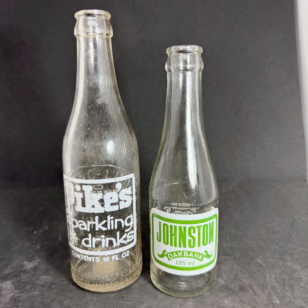 2 Ceramic Label Crown Seals: H. Pike & Co Pty Ltd Oakbank. Pikes Sparkling Drinks. 10 oz Johnston, Oakbank. J. & A. G. Johnston Pty Ltd. 185ml. (South Australia)