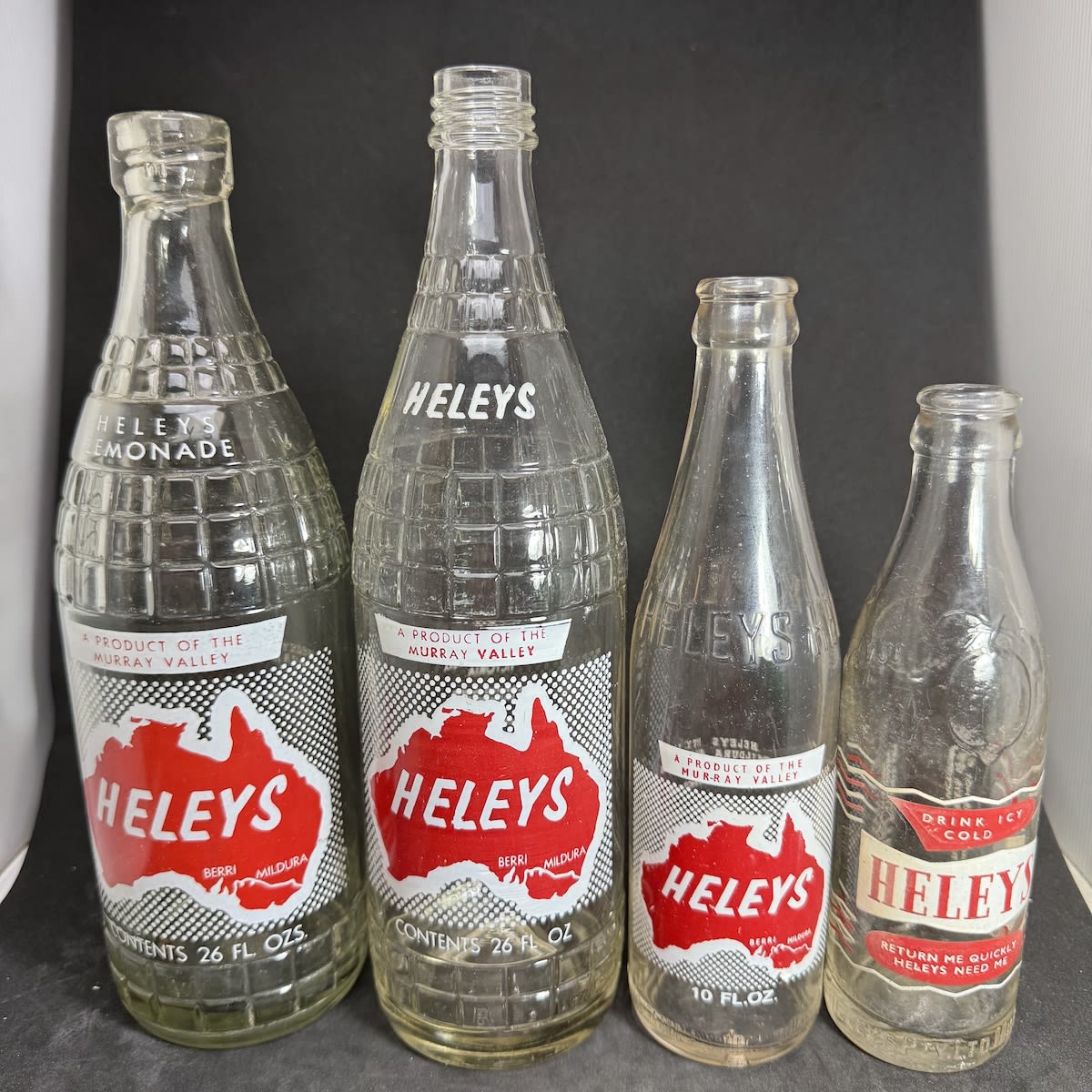 4 Ceramic Label Soft Drink Bottles. All Heley's Mildura & Berri. Internal Thread, Screw Top and 2 different Crown Seals. (Victoria & South Australia)