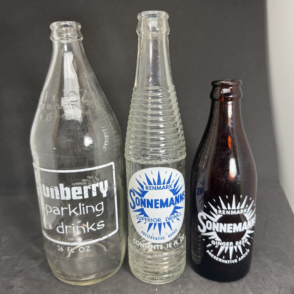 3 Ceramic Label Crown Seals: Sunberry Sparkling Drinks, One Trippa Sonnemann's Superior Drinks, F. A. Sonnemann Ltd, Renmark Sonnemanns Ginger Beer. (South Australia)