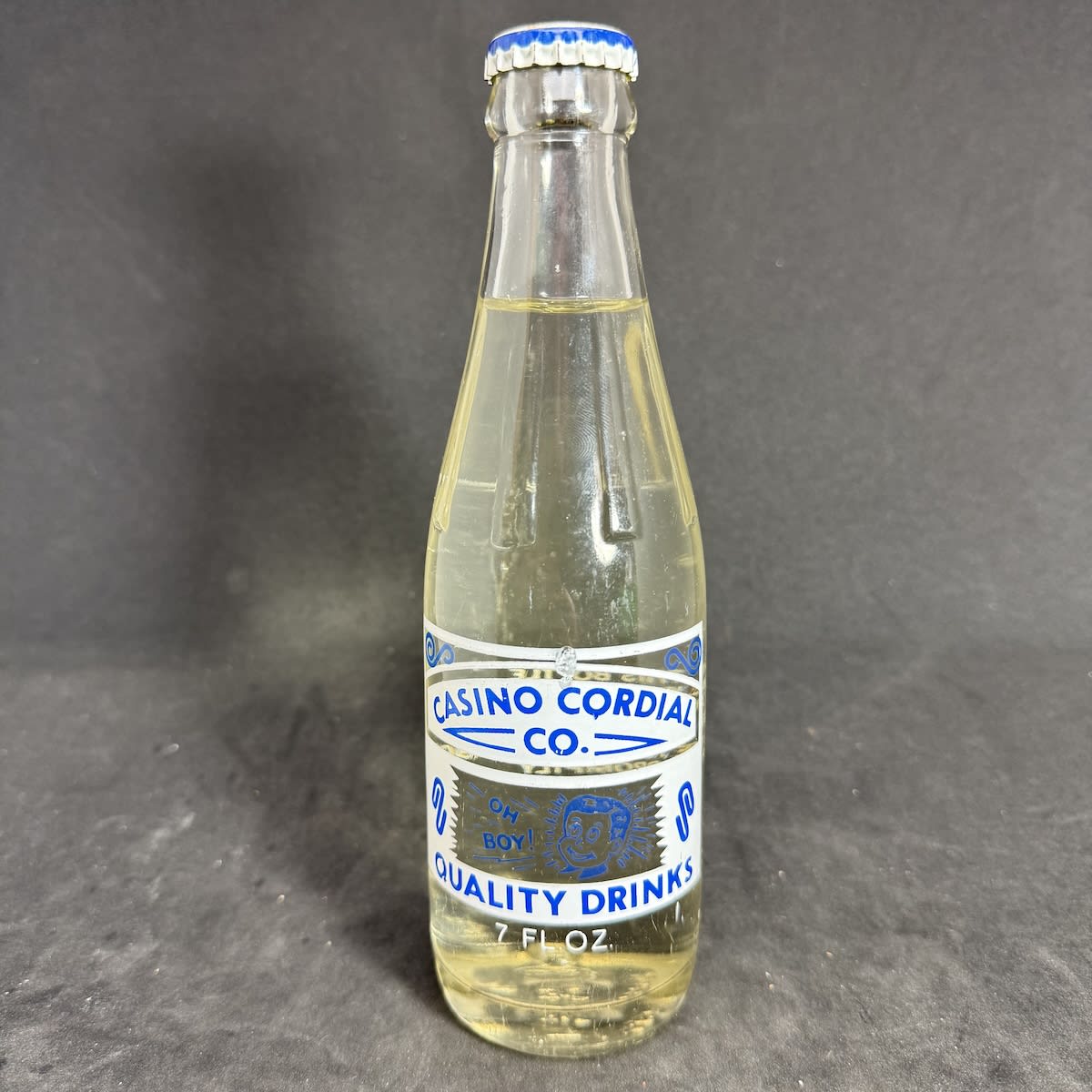 Ceramic Label Crown Seal. Casino Cordial Co. Oh Boy! Blue & White Print. 7 oz. Sealed with generic Tonic Water cap. (New South Wales)